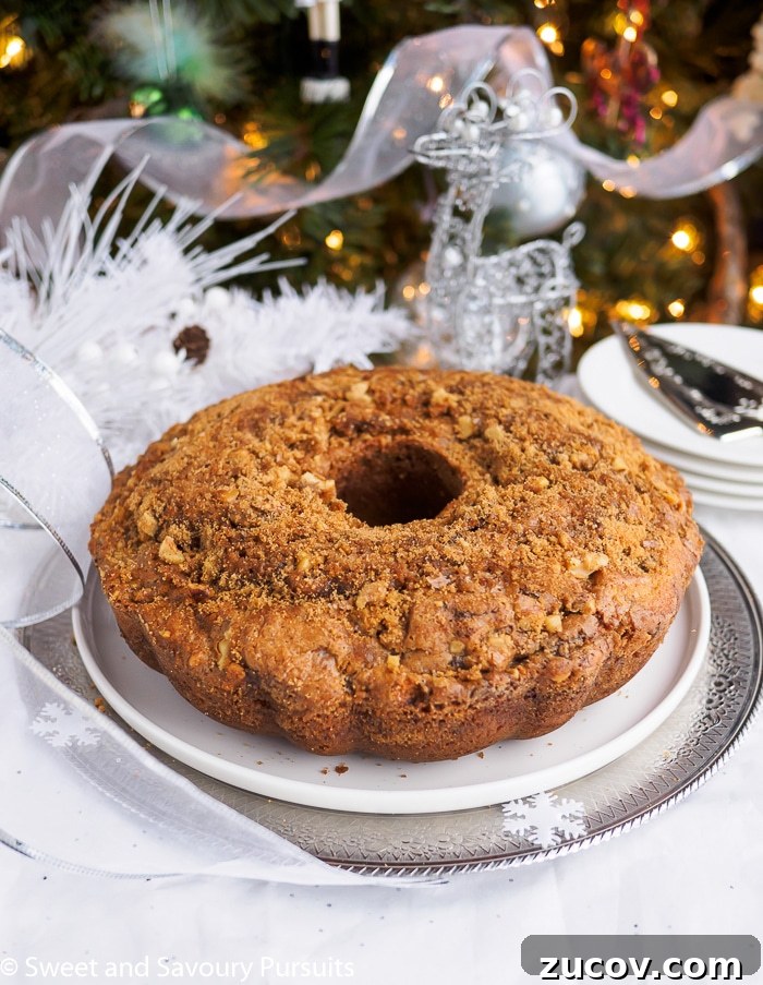 Decadent Chocolate Cinnamon Bundt Cake Recipe 2 Cinnamon swirl bundt cake on platter.