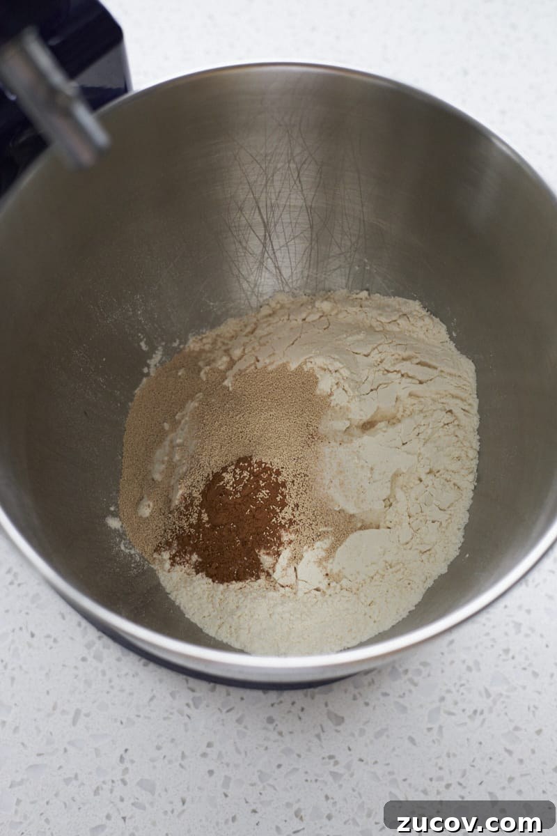 Sourdough-Discard Pumpkin Dinner Rolls for Fall Baking 4 Dry ingredients in the bowl of a stand mixer.