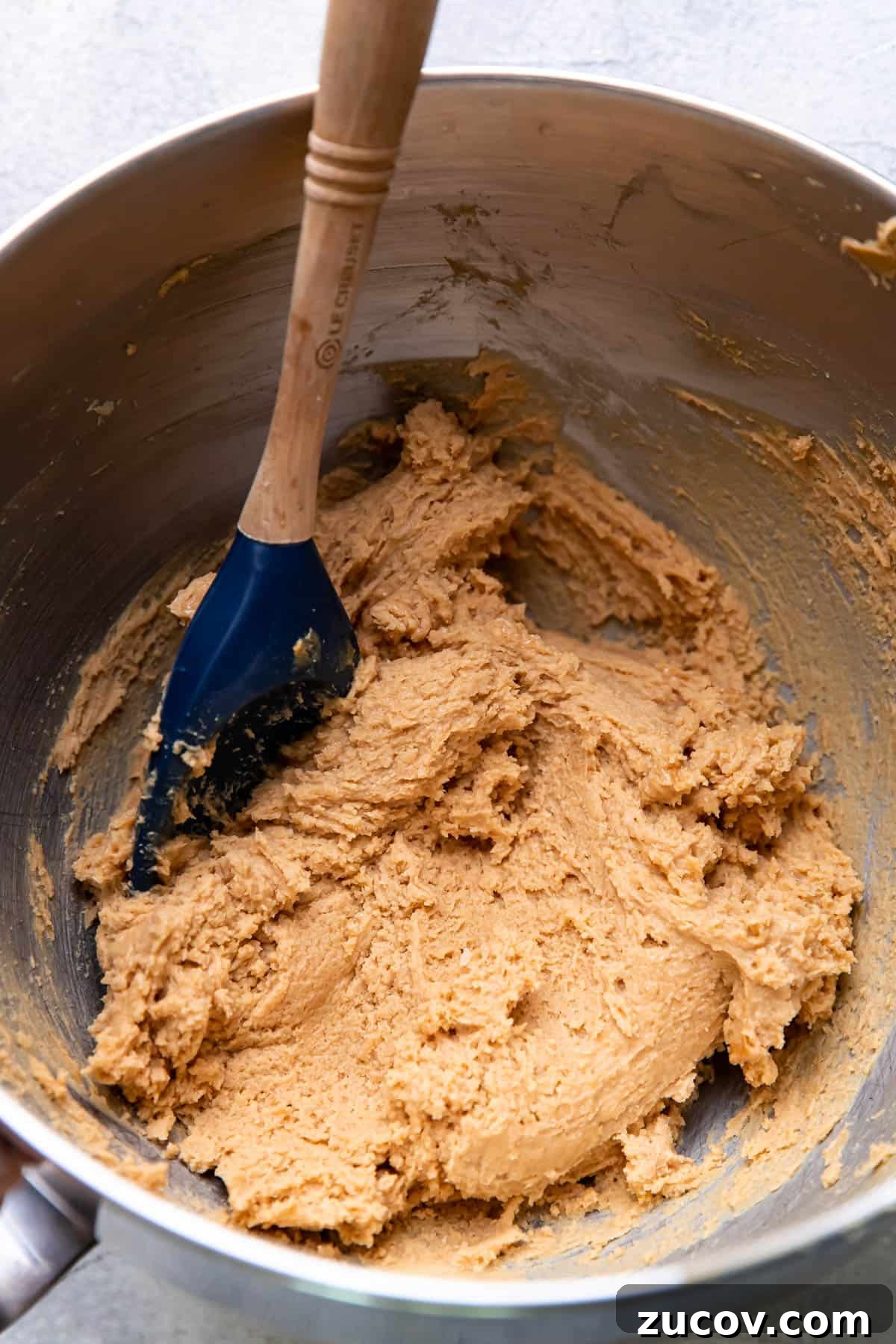 Spider Peanut Butter Cookies Recipe for Halloween Treats 5 peanut butter cookie dough in a bowl.