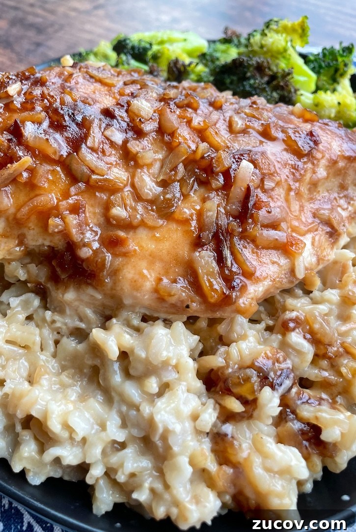 Creamy Chicken and Rice Casserole for a Relaxed Weeknight 10 Close up picture of Forgotten Chicken, a quick and easy dinner casserole made with creamy rice and chicken breasts, seasoning with a packet of onion soup mix.