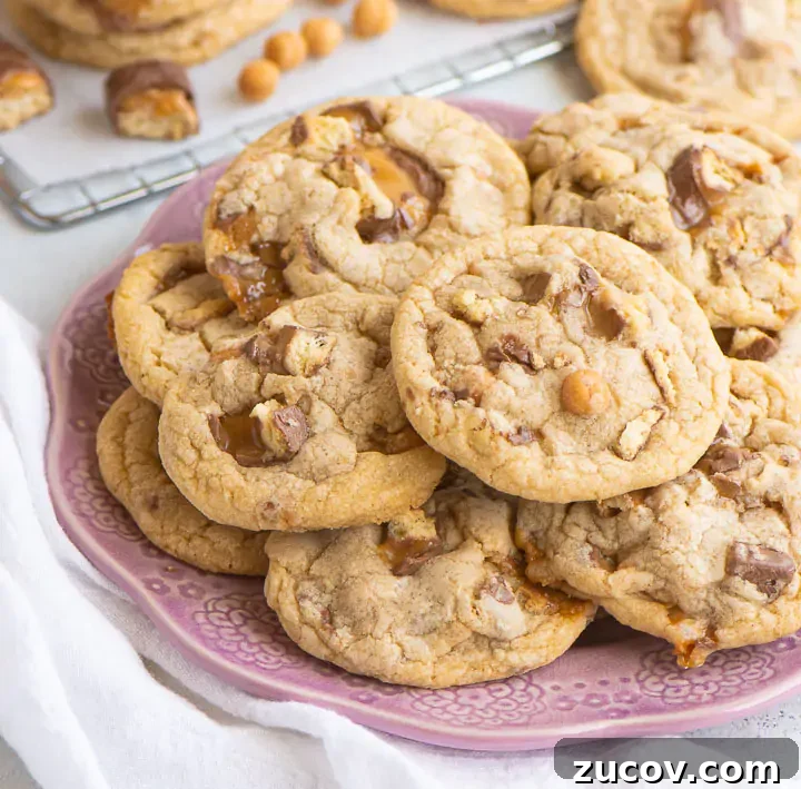 Twix Cookie Recipes: Homemade Bars and Crunchy Bites 2 cookies stacked on a plate
