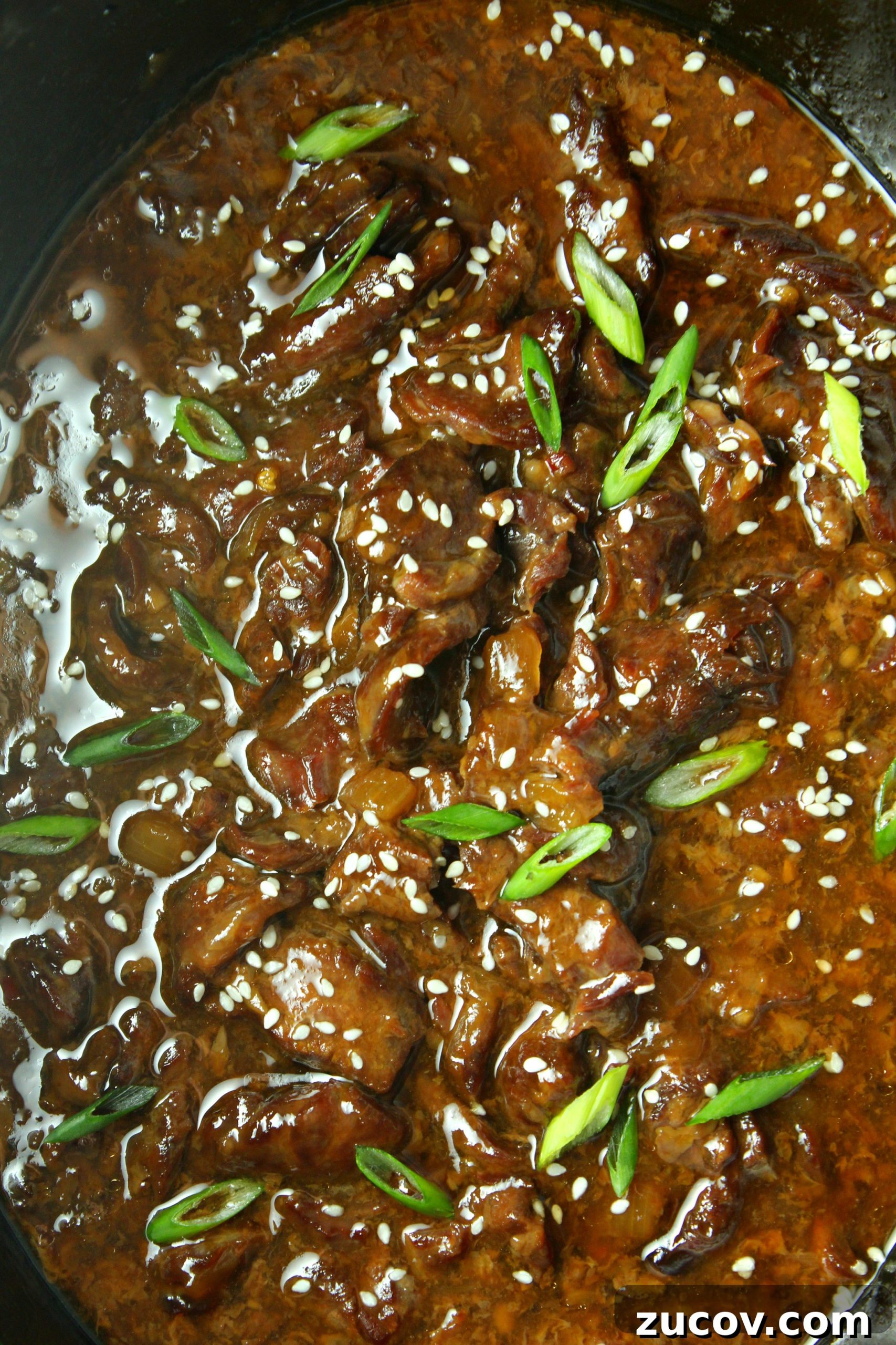Korean-Style Slow Cooker Beef with Savory Sauce 3 Served over rice