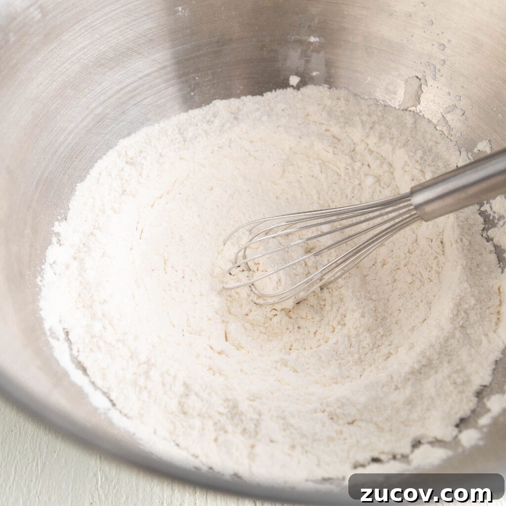 7-Up Pound Cake Recipe: Classic Southern Soul Food Treat 6 whisking flour, cornstarch, salt, baking powder, and baking soda in a large bowl