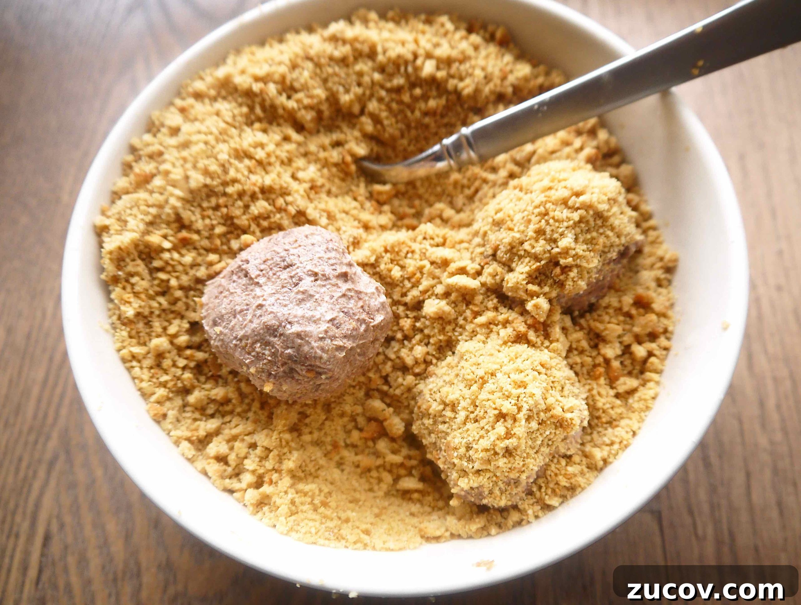 Paleo Chocolate Mousse Truffles Recipe for Decadent Snack 12 Paleo mousse rolled into a ball and put into cookie crumbs, rolled again and covered in crumbs again.