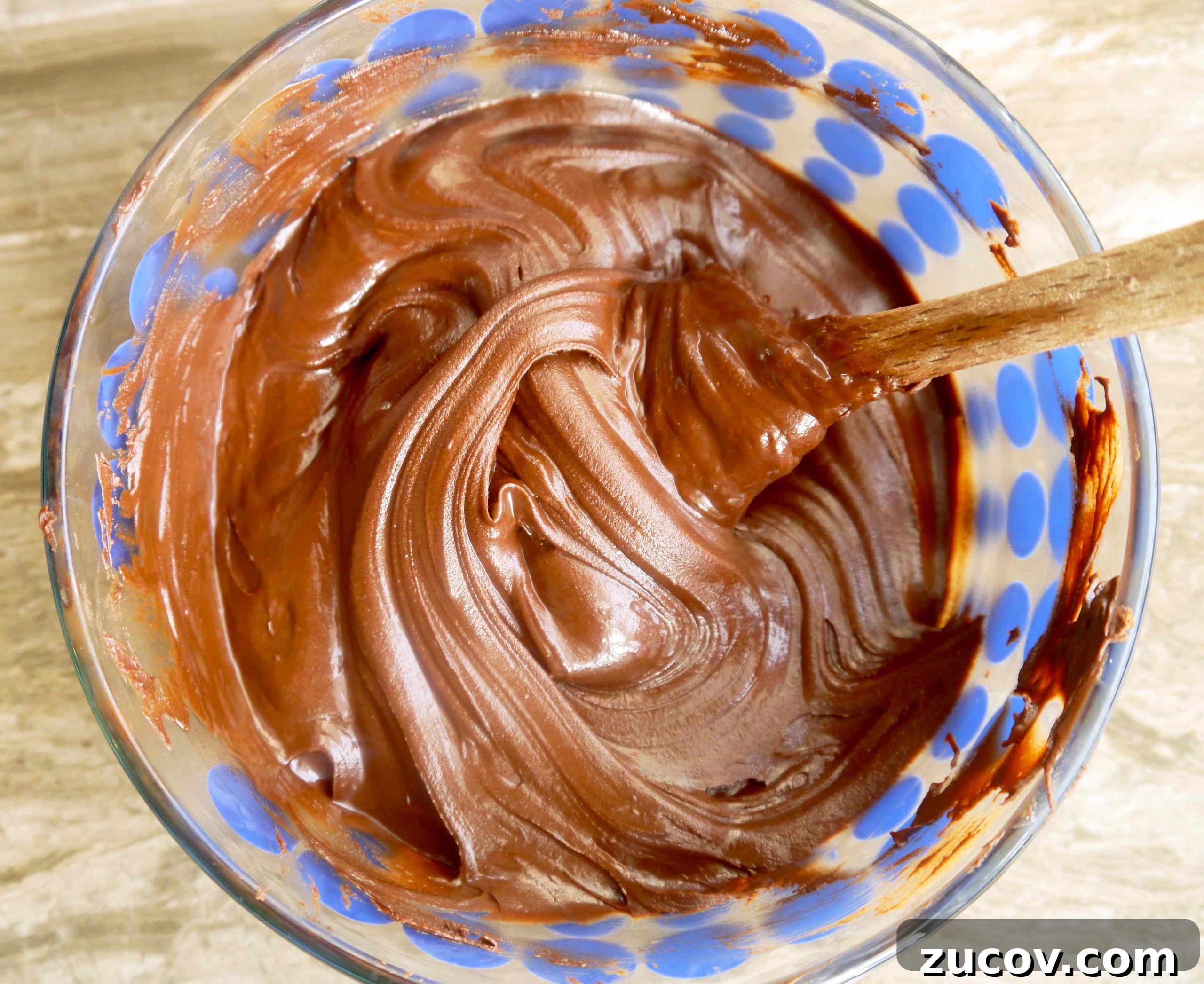 Paleo Chocolate Mousse Truffles Recipe for Decadent Snack 8 Melted dairy-free chocolate in a bowl.