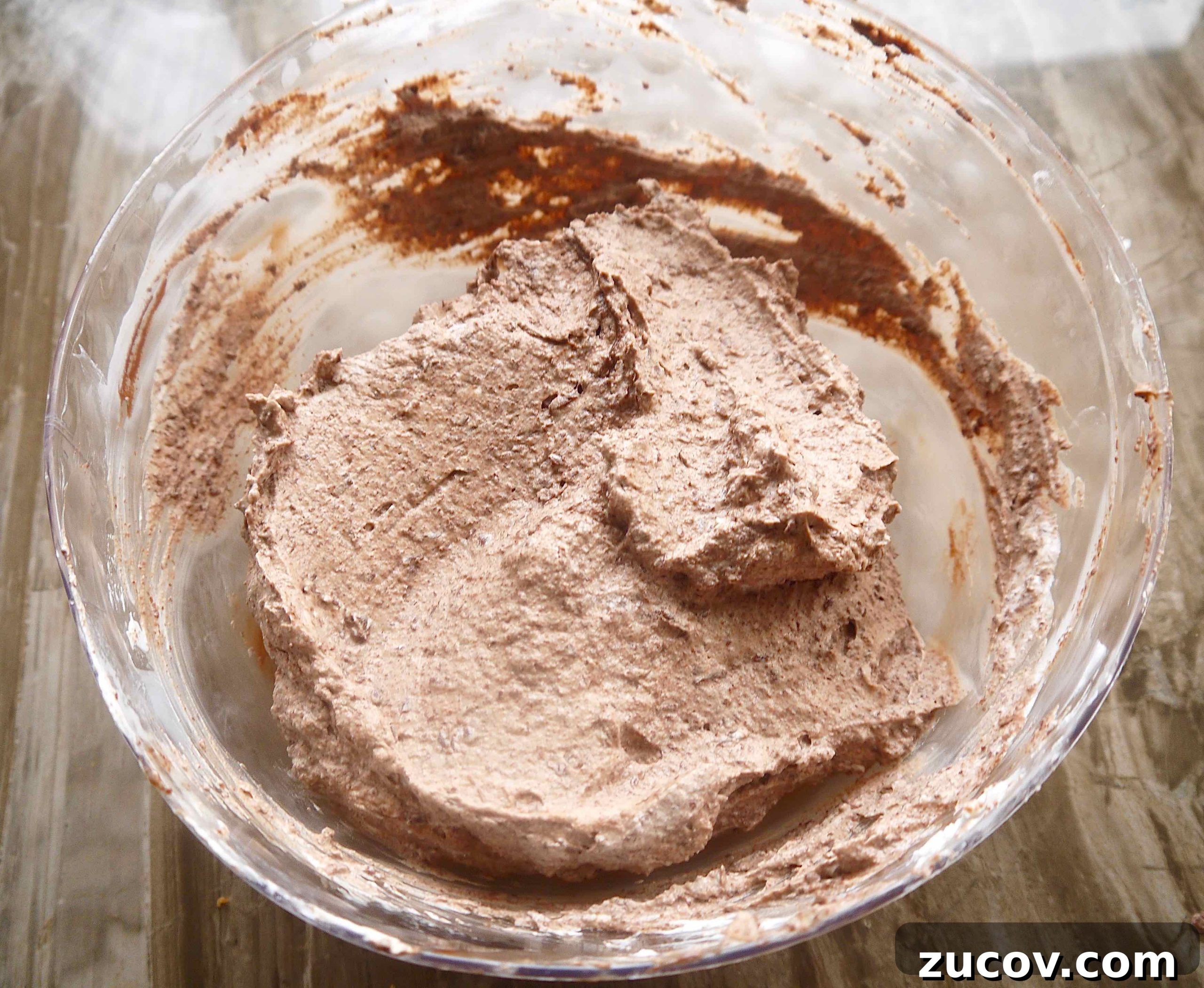 Paleo Chocolate Mousse Truffles Recipe for Decadent Snack 10 Melted chocolate and coconut cream mixed together.
