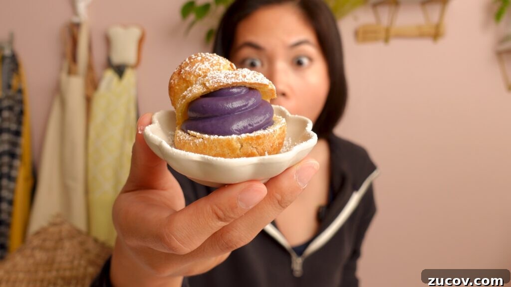 Ube Cream Puffs: Filipino Purple Yam Pastry Recipe 2 Ube cream puffs on a tray
