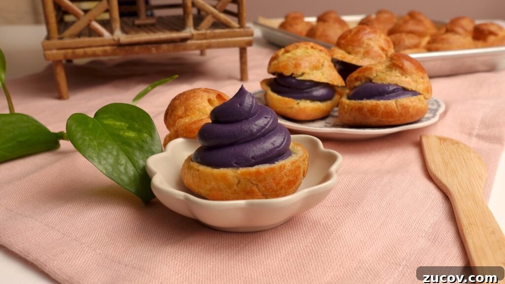 Ube Cream Puffs: Filipino Purple Yam Pastry Recipe 12 Slicing and filling puffs