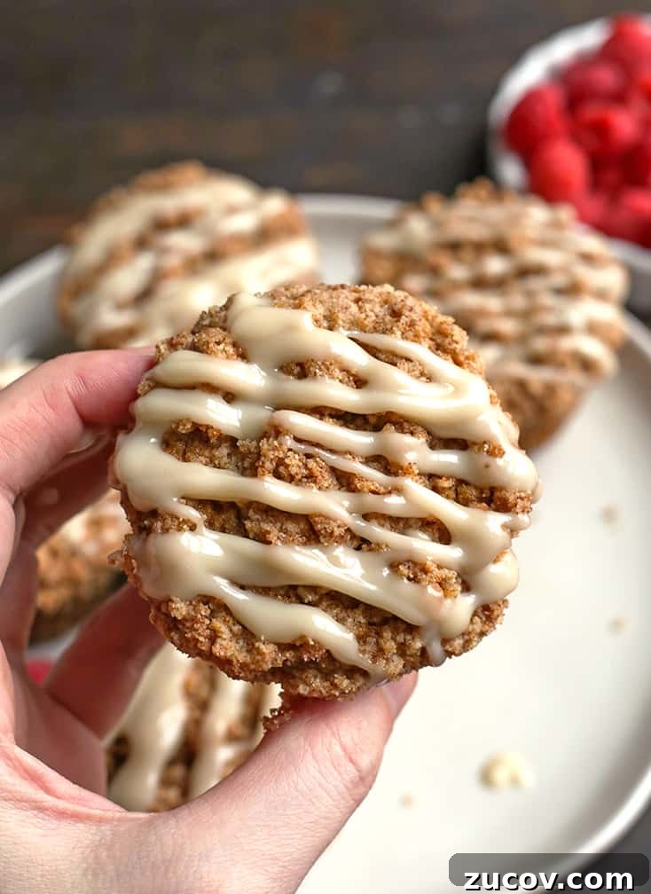 Paleo Coffee Cake Muffins Recipe — Gluten-Free Morning Treat 3 hand holding a paleo coffee cake muffing