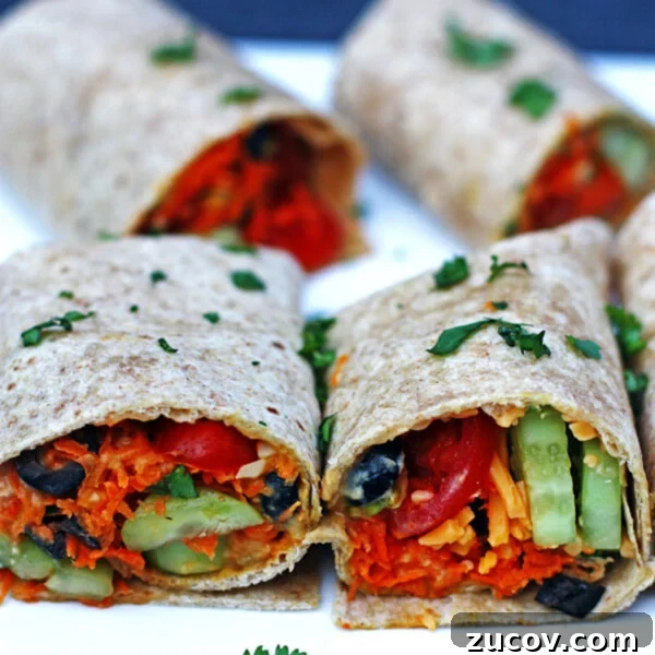 Smoky BBQ Chicken Quesadillas with Melty Cheese and Cilantro 6 Four whole wheat veggie wraps with tomatoes, hummus, carrots, cilantro, olives, and cucumber.