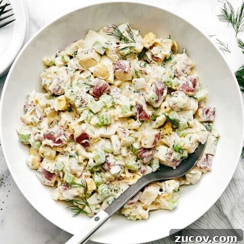 Potato salad with a fork.